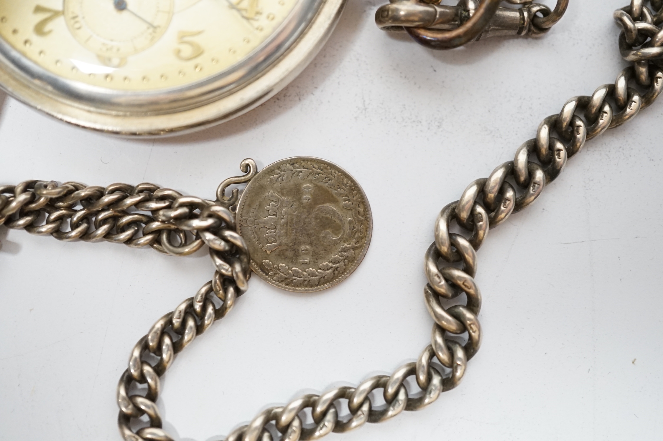 A silver open face pocket watch by Benson, London, an 800 standard hunter pocket watch by Havila and two others including a black dial Ingersoll Radiolite.